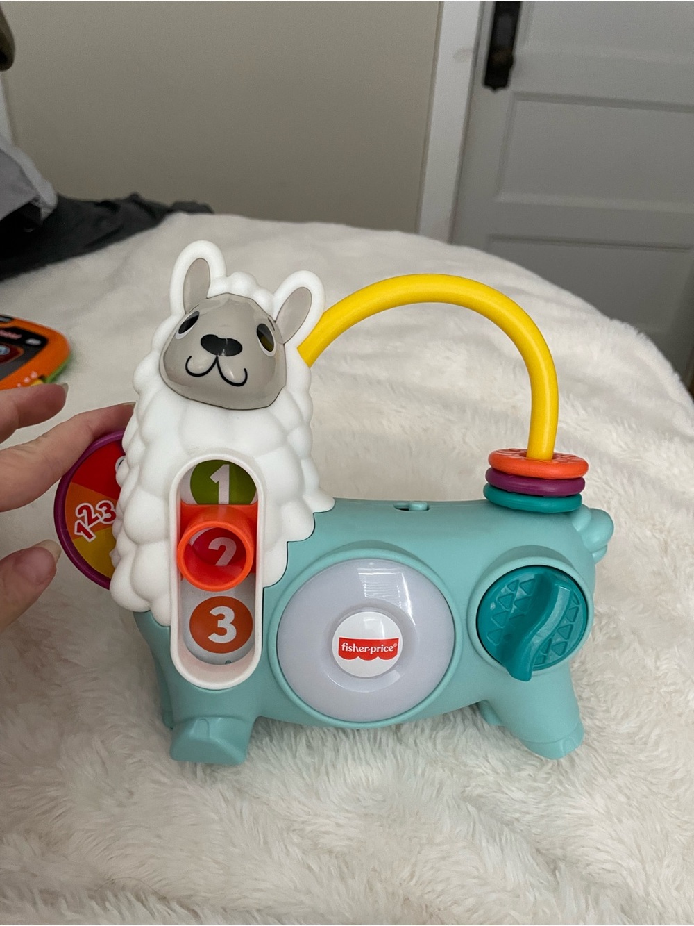 Fisher-Price Teal Llama Activity Toy with Yellow Handle and Multicolor Rings